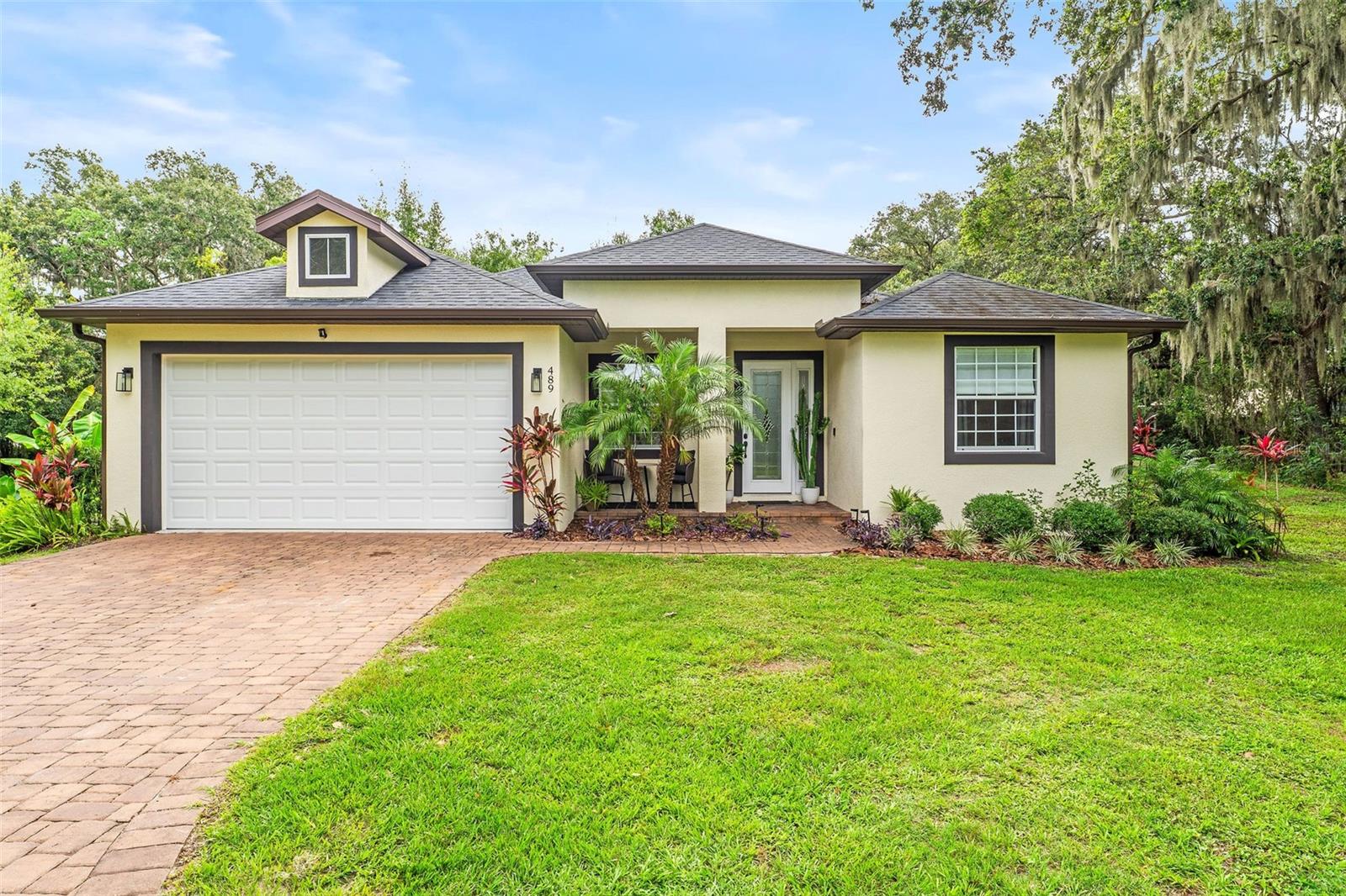 Welcome to your private oasis at 489 Grape Ave in Saint Cloud! This stunning 3-bedroom, 2-bathroom ranch-style home, built in 2019, offers 1,792 sq ft of thoughtfully designed living space on nearly an acre of land. Step inside to discover an open floor plan adorned with elegant tile flooring throughout the main living areas and one of the bedrooms, while the remaining two bedrooms feature cozy carpeting. The home showcases exquisite woodwork and trim details, adding a touch of sophistication to every room. The gourmet kitchen is a chef's dream, boasting stone countertops, ample cabinetry, and modern appliances, seamlessly flowing into the spacious living and dining areas—perfect for entertaining guests or enjoying family time. Retreat to the expansive backyard, a true resort-like haven. Whether you're hosting gatherings or seeking solitude, the outdoor space offers endless possibilities for relaxation and recreation. Additional features include a 2-car attached garage and a location that combines tranquility with convenience, lawn care included in the rent as well as a washer and dryer for tenant convenience. Situated in a great central location, you're just minutes away from downtown Saint Cloud, Lake Tohopekaliga, Lake Nona, and Medical City. Don't miss the opportunity to make this rental home your place for luxury, comfort, and accessibility. Schedule your private tour today and experience the charm of 489 Grape Ave firsthand! A pet may be considered on a case by case basis and would require a non-refundable pet fee. Prospects must view the home prior to applying. Tenant requirements include: minimum gross household income of 3x the monthly rent amount, a favorable background and credit screening, favorable rental history and references, proof of income/employment. A security deposit (same as rent) is due upon applicant approval (within 24 hours) to mark listing as Pending. First month rent and last month's rent are due 7 business days prior to lease start date. The owner does not allow smoking in or around the home. Tenants are required to provide proof of renter's insurance and a $1/month convenience fee applies for use of management platform and tenant portal. Tenants are responsible to pay all utilities and put in their name. Lease agreements are drafted by an attorney after the deposit is received and are non-negotiable. Deposits are fully refundable until lease signing. Please review these requirements BEFORE requesting a showing. After viewing, listing agent will provide application link, upon request. If a tenant-prospect chooses to apply for one of our rental properties, that DOES NOT guarantee that the prospect's application will be approved. The application fee is NON-REFUNDABLE. Tenant approval is contingent on a lease start date within 35 days of application.
