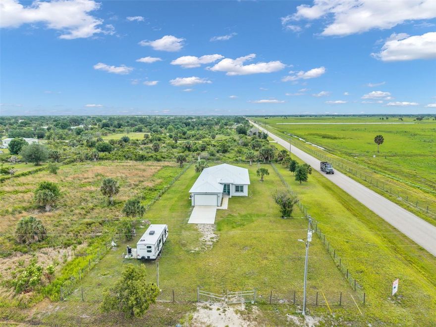 Brand-new 2025 CBS construction on 1.25 acres! This 4BR/2.5BA home offers 2,113 sq ft under air and 2,923 TLA with a modern split floor plan and upscale finishes throughout. Features include wood-look Laminate flooring, tray ceilings, recessed lighting, and an open-concept living area with oversized sliders leading to the covered patio. The kitchen boasts granite countertops, shaker cabinets, stainless steel appliances, and a large island perfect for entertaining. Spacious primary suite features dual walk-in closets, dual vanities, soaking tub, and tiled walk-in shower. Indoor laundry room, oversized covered patio, and 2-car garage complete this beautifully designed home with room for a pool, workshop, RVs, or boats.