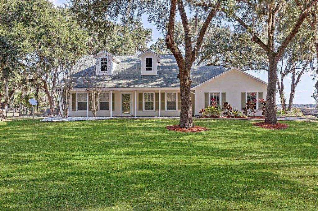 Photo of 3355 Lake Tohopekaliga Road, Saint Cloud, FL 34772 (MLS # S5141501)