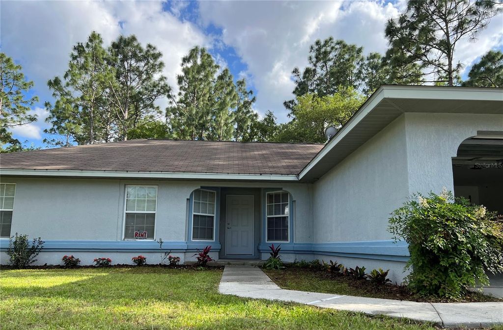 Photo of 612 Marion Oaks Trail, Ocala, FL 34473 (MLS # O6376457)