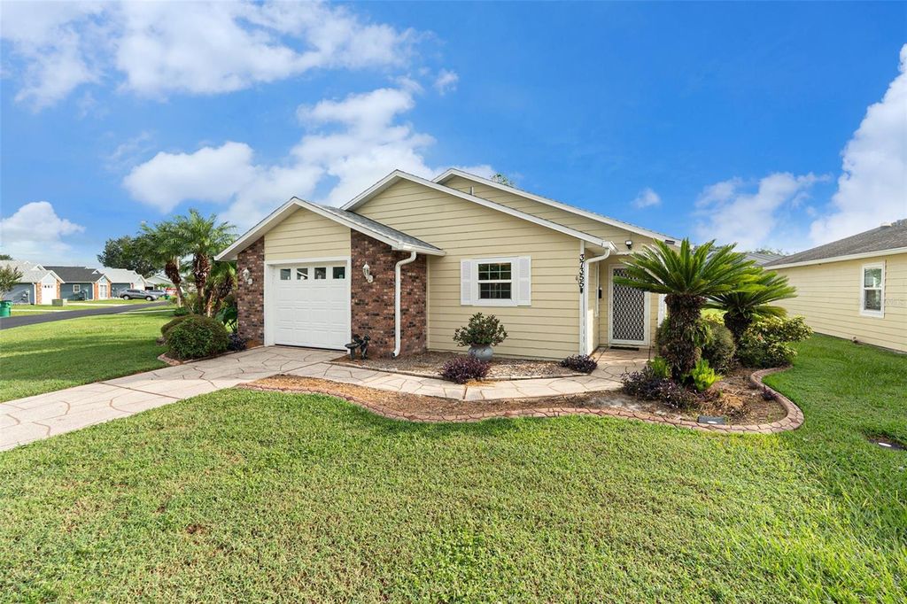 Photo of 37355 Derbyshire Drive, Zephyrhills, FL 33542 (MLS # O6344081)
