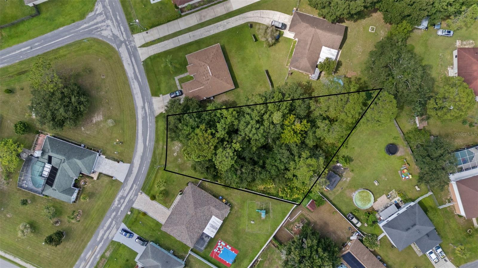 The seller owns 12 lots in Poinciana, several on the same street, which can be PURCHASED IN BULK, presenting a rare opportunity for builders or investors to secure multiple parcels at once at a discounted rate. MLS Numbers: O6335500, O6335683, O6335685, O6335689, O6335698, O6335703, O6335716, O6335719, O6335719, O6335726, O6335730. This oversized lot at 1306 Burnley is in an ideal location and is ready for your next project. The low HOA fee includes access to the Poinciana Victory Pool, Aquatic Center with 8 lap lanes, and the APV Community Center featuring event rooms, an amphitheater, a fitness center, and expansive outdoor recreation with sports fields, basketball courts, playgrounds, picnic areas, and walking trails. High-speed internet (300 Mbps) and cable TV (250+ channels) are also included. The lot is conveniently located near shopping centers and restaurants. It’s a short drive to Disney, SeaWorld, Universal Studios, Legoland, and Orlando International Airport, offering both lifestyle and convenience. This lot is perfect for new construction or long-term investment. With low HOA fees, abundant amenities, and strong area growth, these Poinciana lots provide unmatched opportunity for builders, investors, or future homeowners.