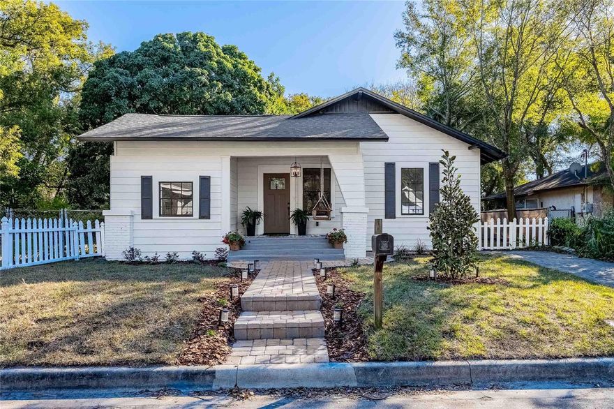 Fall in love with this FULLY RENOVATED 3 bedroom, 2 bath BUNGALOW located in the desirable Southeast Seminole Heights neighborhood. This home is STUNNING with NEW ROOF and all FURNISHINGS ARE NEGOTIABLE! As you approach the home, you'll be captivated by its lush landscaping and charming porch with the FRONT PORCH SWING you have always wanted!  Inside, you'll find a thoughtfully designed interior with neutral paint, high ceilings, beautiful luxury vinyl floors, tall baseboards, and numerous updates that enhance its appeal. The home opens with an inviting oversized living and dining area combo. Hosting parties in this space will be a joy! But let's talk about this kitchen! It's a dream for any aspiring chef! Featuring popular natural and grey shaker cabinetry with all the organizational bells and whistles, built-in pantry, coffee bar nook, OVERSIZED FARMHOUSE SINK, a STAINLESS APPLIANCE PACKAGE and brushed modern brass pot filler! Adjacent to the kitchen, the family room provides a cozy setting for movie nights or a perfect reading space.  The primary suite is a spacious retreat. It showcases a large WALK-IN CLOSET, large windows, and a LUXURIOUS RENOVATED en suite bath complete with a Smart mirror with ADJUSTABLE LED LIGHTING and a custom tiled shower. Across the hall, you'll find a generous secondary bedroom with a spacious closet and large windows that flood the room with natural light. Continuing with the renovations you will find a second full bath and a third bedroom that would be perfect for a home office. Step outside into your own private oasis through NEW SLIDING DOORS off your family room and experience the essence of Florida living. The backyard is adorned with beautiful large oak trees a built in GAZEBO that is ideal for outdoor hosting family and friends. There's plenty of room to store beach or water toys making this home perfect for outdoor enthusiasts. Conveniently located near Florida's most popular beaches, Armature Works, downtown Tampa, attractions, parks, and historical landmarks, this fully updated bungalow seamlessly blends modern updates with original features, offering the best of both worlds. Don't miss out on the opportunity to live the dream!