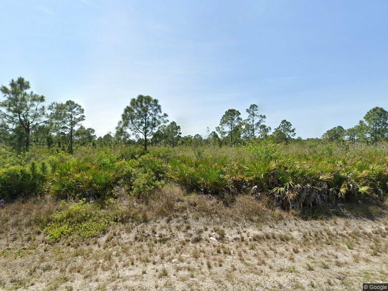 Come Build Your Dream Home! This spacious half-acre lot in desirable Lehigh Acres, Southwest Florida offers the perfect balance of tranquility and convenience. Located just an hour from Fort Myers and the world-famous Sanibel Beaches, you’ll have endless options for weekend fun—whether it’s relaxing by the shore, exploring nearby parks, fishing, boating, horseback riding at local equestrian facilities, golfing, shopping, or dining out. With plenty of room to design your ideal home, yard, and lifestyle, this property gives you the freedom to create the Florida life you’ve always imagined. Don’t miss your chance to own a piece of true Florida living!
