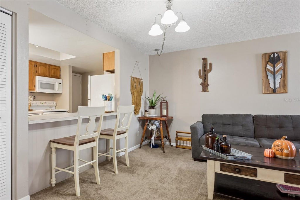 Photo of 7920 N Tangerine Drive #265, Temple Terrace, FL 33637 (MLS # TB8552193)