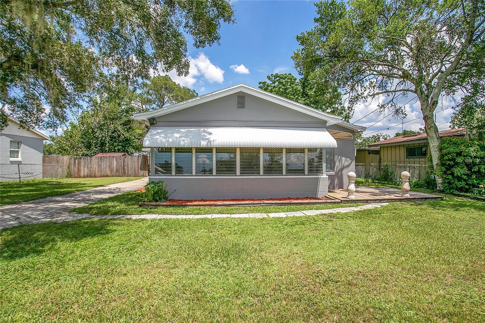 Welcome to 4427 Fairview Ave, a charming block home in the highly desirable 32804 zip code of Orlando! This solid 3-bedroom, 2-bathroom property offers 1,260 sqft of living space on a spacious 10,129 sqft lot which is nearly a 1/4 acre. Built in 1952, this home offers a great structure and even better potential, making it an excellent opportunity for investors, first-time buyers, or anyone looking to customize their perfect space.
Inside, you'll find fresh new paint and new flooring, creating a clean, updated feel. The layout offers flexibility and functionality, with room to make it your own. The large kitchen has a generous amount of counter top space as well as storage and there is still plenty of space for your table to gather at. A brand new roof was just installed in July 2025, providing peace of mind for years to come.
The large backyard offers endless possibilities, whether you want to create an outdoor living space, garden, or expand. A carport provides covered parking to beat the heat or afternoon rain.
With a convenient location close to shops, restaurants, services, schools, boat ramps on Lake Fairview and major roadways like I-4, this home combines accessibility with potential. While it may need some cosmetic updates, the solid block construction and recent upgrades make this a fantastic foundation for your next chapter.