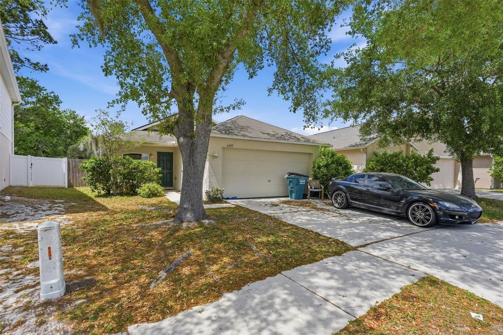 Photo of 6405 Tabogi Trail, Wesley Chapel, FL 33545 (MLS # TB8493273)