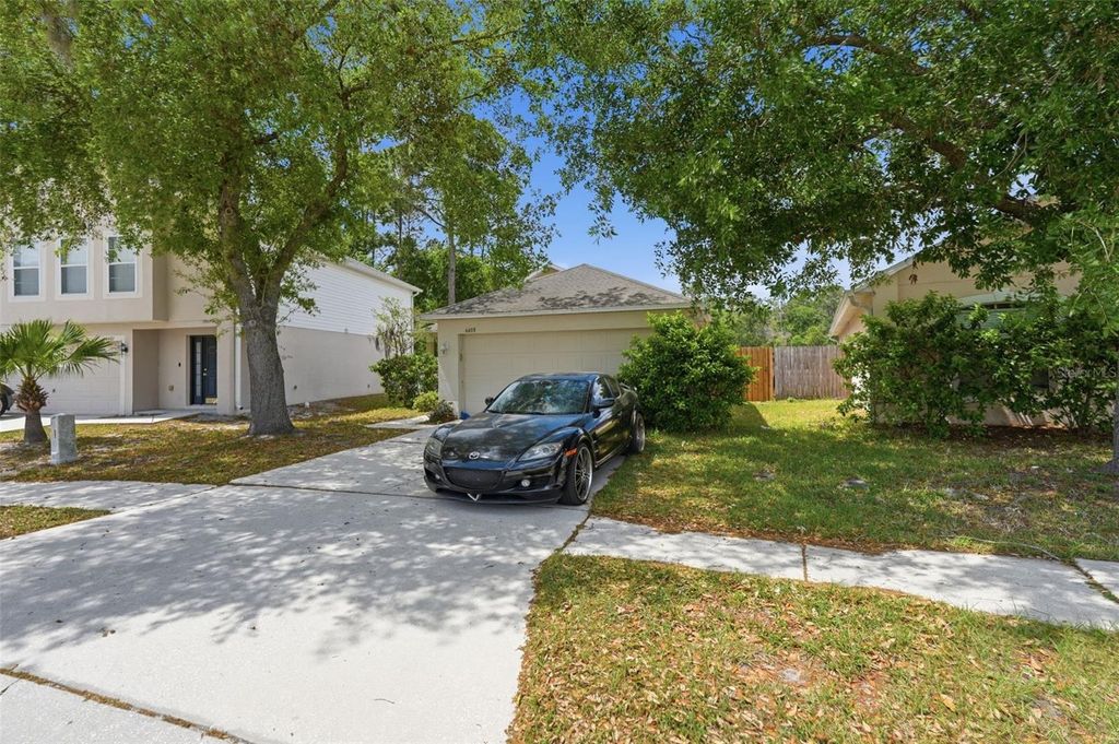 Photo of 6405 Tabogi Trail, Wesley Chapel, FL 33545 (MLS # TB8493273)