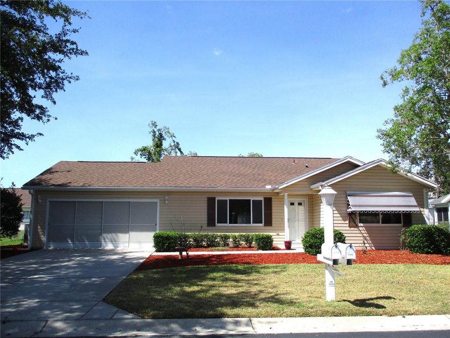 Cute, comfortable, and move in ready, 2 bedroom 2 bath, 2 car garage home with a bright and sunny Florida room and fenced yard!  Lovely kitchen updates with granite counters, oak cabinets and pull out drawers. No carpet anywhere! You will appreciate the easy to maintain Laminate flooring thru-out with tile in the kitchen and baths.  Stone counters in both baths with tub/ shower in guest bath,  and spacious walk in shower and large walk-in closet in primary. 2019 HVAC has a POC PLUS air purifying/ humidity control system. ROOF 2018, WATER HEATER 2019, TERMITE BOND, SPECTRUM FIBER WIFI. In the fun friendly 55+active gated golf community of SPRUCE CREEK PRESERVE. Loads to do with great activities and amenities like heated pool, hot tub, pickleball, tennis, shuffleboard, corn hole, horseshoes, billiards, fitness center, water aerobics, yoga, exercise classes, chair volleyball, crafts, cards, games, Bingo, bunco, potluck dinners, dances, travel and social clubs. Nestled into Ross Prairie Nature Preserve creating a peaceful atmosphere. Golf course weaves thru SCP and is easily accessible by golf cart from anywhere in the community. Less than 4 miles from hospitals, doctors,  groceries, restaurants, shopping, and miles of hiking and biking nature trails. North Central Florida location is ideal for day trips from coast to coast!