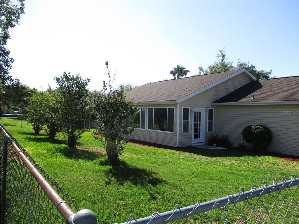 Photo of 11579 SW 140th Loop, Dunnellon, FL 34432 (MLS # OM723349)