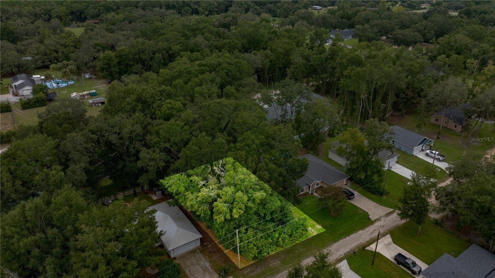 Discover the PERFECT SPOT for your future home on this .22-acre lot in Rolling Ranch Estates. Ideally located just two blocks from Highway 484, you'll enjoy QUICK ACCESS TO SR 200 shopping, dining, and medical facilities, while also being ONLY MINUTES FROM the crystal-clear waters of the RAINBOW RIVER for swimming, kayaking, and tubing. Power lines present, but no dedicated power pole on property yet. *Property backs up to a .43 acre lot that is also available for purchase (MLS# OM709173)*