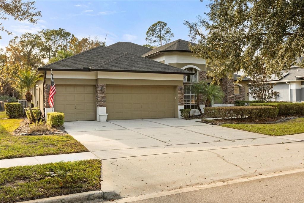Photo of 5586 Whispering Woods Point, Sanford, FL 32771 (MLS # O6371986)