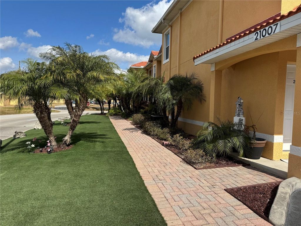 Photo of 21007 Sunpoint Way #202, Lutz, FL 33558 (MLS # W7883053)