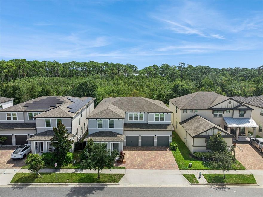 Welcome to this immaculate and move-in ready Lafayette model in the highly sought-after Watermark at Horizon West. Perfectly situated on a unique homesite offering rare privacy both in the front and the back, this stunning residence boasts 5 spacious bedrooms, 3 full baths, and 2 half baths—designed for both everyday living and effortless entertaining. Step inside and fall in love with the open-concept layout, soaring ceilings, upgraded flooring, and expansive living spaces. The inviting foyer features a sitting room and grand staircase, leading into the great room with dramatic 20-foot ceilings and sweeping views of your private backyard with no rear neighbors. The chef’s gourmet kitchen is a true showstopper, featuring an induction cooktop, statement vent hood, quartz countertops, an oversized island, beautiful backsplash, stainless steel appliances, and custom cabinetry with crown molding. A large walk-in pantry provides ample storage, while the additional bar area is perfect for your morning coffee or evening cocktails. The first-floor owner’s suite offers a serene retreat with a tray ceiling, large windows framing private views, and a spa-like ensuite bath complete with a glass-enclosed shower, freestanding soaking tub, dual quartz vanities, and a spacious walk-in closet. Upstairs, a versatile loft provides the ideal space for a home office, media room, or play area, while four generously sized bedrooms each have walk-in closets and share upgraded Jack-and-Jill baths. Additional highlights include: luxury vinyl flooring throughout, a 3-car garage with epoxy flooring, fresh interior and exterior paint (2025), and countless thoughtful upgrades. Enjoy resort-style amenities at the Watermark clubhouse, featuring a state-of-the-art fitness center and luxury pool—perfect for relaxation or recreation. You're also nestled within a well-established community, this property enjoys an enviable location close to major highways, ensuring convenient access to all amenities. Just minutes away, residents can indulge in excellent shopping opportunities, dine at a variety of luxury and casual eateries, and explore nearby theme parks for entertainment. The neighborhood benefits from proximity to brand-new, state-of-the-art hospitals and a top notch school system, providing peace of mind for residents seeking quality healthcare services and high end education for their family. This vibrant community offers an abundance of options to suit every lifestyle need and preference. Call today to schedule a private tour.