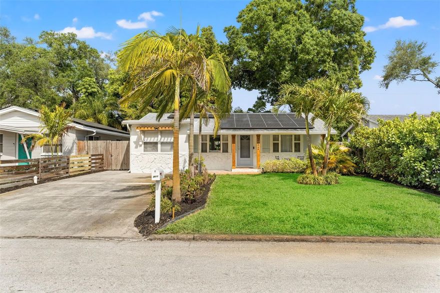 In Gulfport, mornings start with bike rides to coffee, evenings unfold by the water, and spontaneous plans rarely require a car. Local markets, art walks, live music, and waterfront sunsets are part of the weekly routine — and this home lets you step right into that rhythm.

Just moments from the waterfront, this well-maintained block cottage with coastal character offers a comfortable, low-maintenance setting designed for everyday living and easy enjoyment of the Gulfport lifestyle.

Inside, the home has been completely renovated with a cohesive, move-in-ready feel. Wood-look tile flooring runs throughout, paired with an updated kitchen and refreshed bathrooms that balance style and practicality. The open layout flows naturally from the living room through the kitchen and into the dining area with a custom built-in dining banquette, allowing the space to live larger than its footprint and function well for both daily life and casual entertaining.

A split floor plan adds flexibility and privacy, with bedrooms positioned on opposite sides of the home. One bedroom features a separate exterior entrance and an adjacent flex space, making it ideal for guests, a home office, or a creative workspace. An interior laundry room adds everyday convenience.

Out back, a private tropical setting extends the living space outdoors. Mature landscaping with uplighting, and an expansive paver patio create a low-maintenance environment designed for relaxing and entertaining. Hang your kayaks on the fence mount then hop in the outdoor shower to rinse off. The backyard offers ample space for hosting friends, or setting up a game of cornhole while enjoying Gulfport’s laid-back, outdoor-friendly lifestyle. A detached backyard shed (with electrical) adds even more versatility, offering space for storage, a workshop, or a flexible area that could serve as an art studio, hobby room, or creative retreat.

Recent and meaningful improvements include a newer roof (2021), updated electrical panel (2021), updated sewer line (2023), front porch and walkway pavers, sod, gutters with gutter guards, custom hurricane fabric panels for added peace of mind, and fully paid-off, owned solar panels (2021) that help keep electric costs low (averaging approximately $30–$50 per month). A private driveway provides convenient off-street parking. HVAC and electric tankless water heater are approximately 6-7 years old (2019/2020).

Conveniently located near Beach Boulevard, the Gulfport Marina and Yacht Club, waterfront parks, and just down the block from Skyway trail and Clam Bayou Nature Park, where you can launch a kayak into the mangroves and spend time on the water — with manatees and dolphins often seen throughout Boca Ciega Bay. The area also offers easy access to local restaurants, coffee shops, breweries, markets, and community events.

Well suited as a primary residence or second home, this property captures the appeal of Gulfport living — walkable, water-oriented, and centered around comfort, community, and ease.

No flooding or damage from 2024 hurricanes, or ever to seller's knowledge. Flood insurance quote for under $2,500/year available upon request.

Ask about our preferred lender incentive!