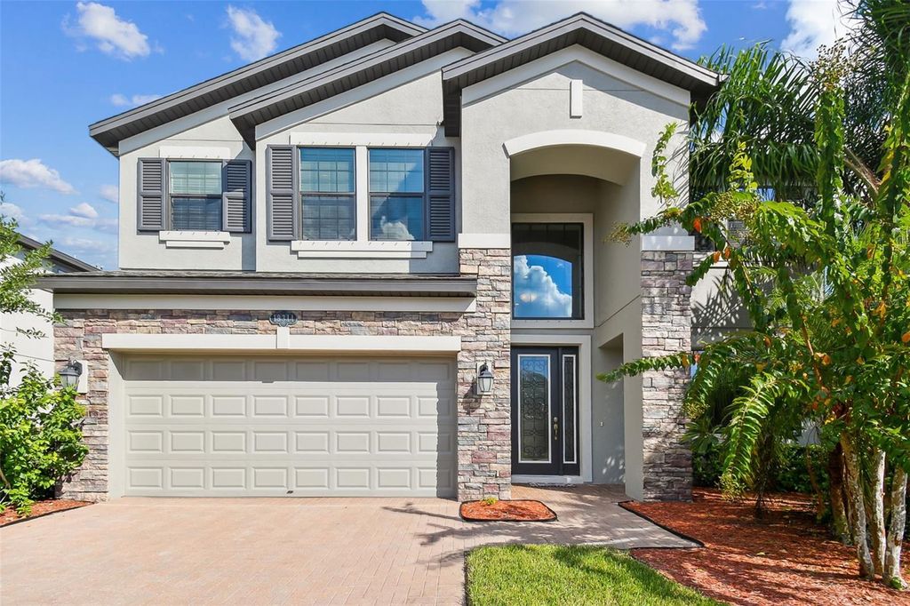 Photo of 19314 Long Lake Ranch Boulevard, Lutz, FL 33558 (MLS # TB8428290)
