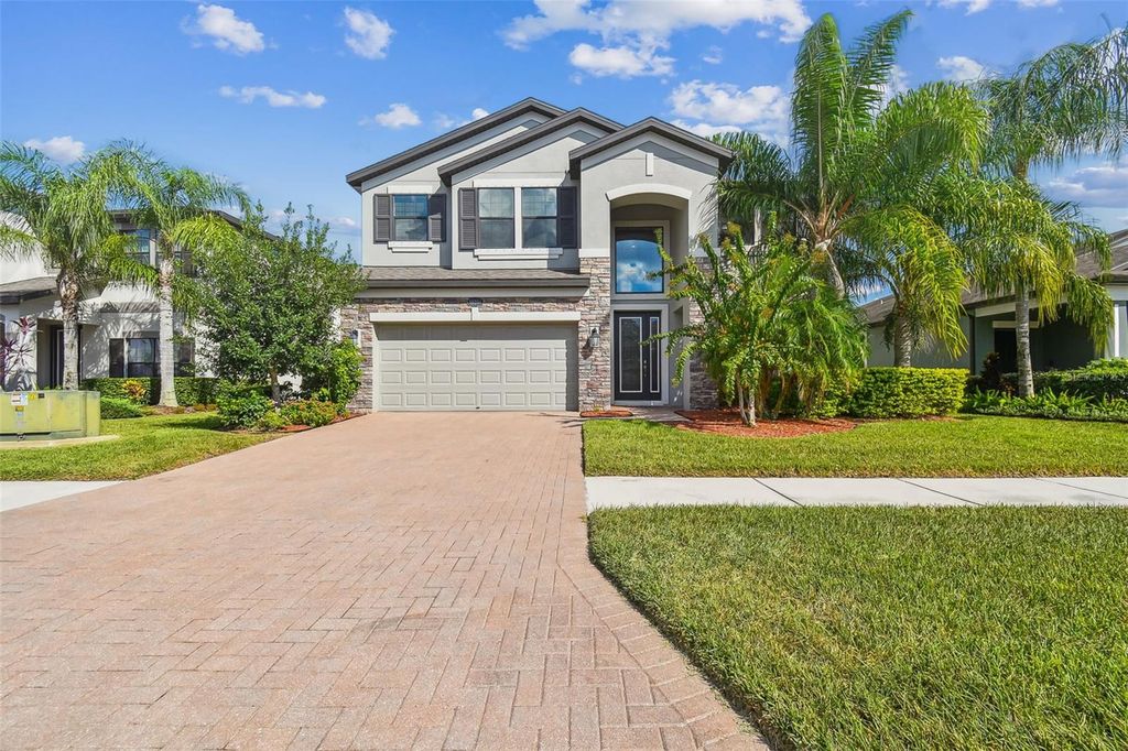 Photo of 19314 Long Lake Ranch Boulevard, Lutz, FL 33558 (MLS # TB8428290)