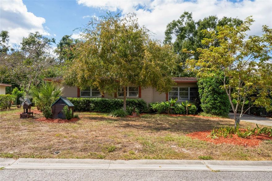 Welcome to this charming Tampa Ranch Style home with an Oasis Backyard, Bonus Room & She Shed. This delightful 2-bedroom, 2-bath home with a bonus office featuring a built-in closet—making it easy to convert into a third bedroom. Offering 1,193 sq ft of living space on an oversized 9,583 sq ft lot, this home blends classic Florida charm with endless possibilities for modern living. 
Step inside to discover a bright and inviting layout with spacious living and dining areas filled with natural light. The kitchen provides ample potential for updates to suit your style, while the additional office/flex room adds incredible functionality—ideal for working from home, guests, or a seamless third-bedroom conversion.
Out back, you’ll find a private, fenced yard that feels like your own tropical oasis—lush landscaping, mature trees, and plenty of room for entertaining, gardening, or simply relaxing with your morning coffee. This space feels like your own slice of paradise with the added touch of an adorable playhouse, which can easily double as a she shed, studio, or creative retreat. There is also a covered carport and ample driveway parking and storage options.
Located in a quiet neighborhood near East Lake-Orient Park, you’ll love being just minutes from major roadways, USF, Busch Gardens, shopping, dining, and all the best of Tampa living. Just 10-15 miles from Tampa International Airport (TPA),and very close to Hard Rock Casino and the Florida State Fairgrounds.