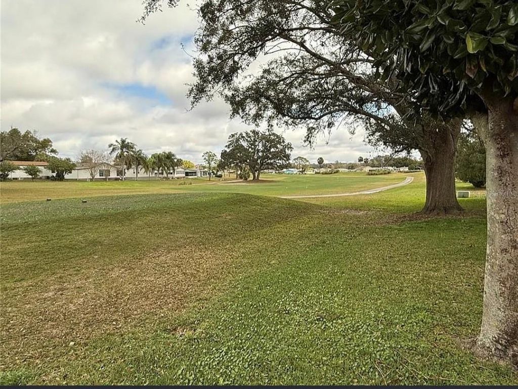 Photo of 1532 W Schwartz Boulevard, Lady Lake, FL 32159 (MLS # G5105798)