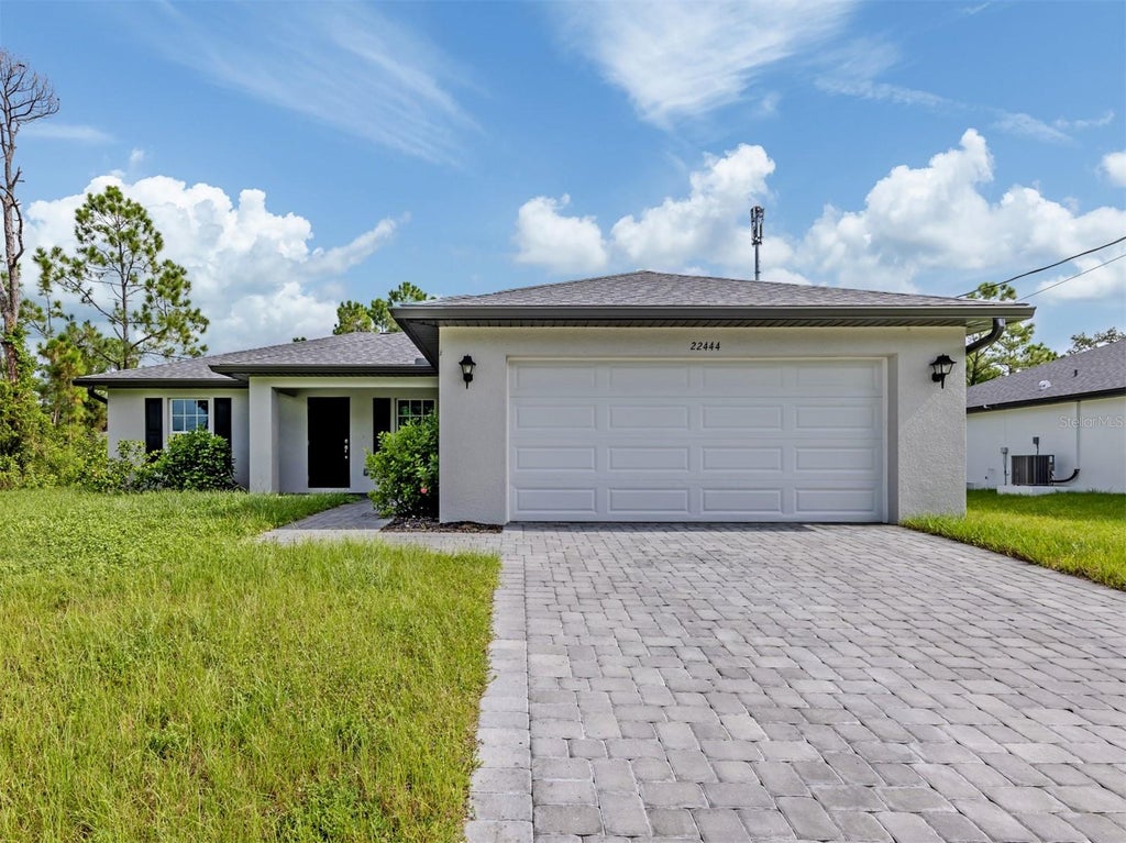 Photo of 22444 Donalda Avenue, Port Charlotte, FL 33954 (MLS # N6145320)