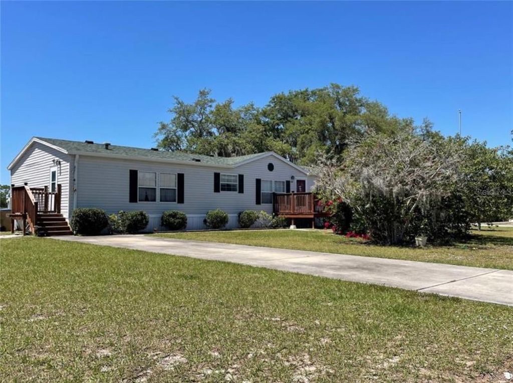 Photo of 1814 Winchester Court S, Saint Cloud, FL 34771 (MLS # S5147651)