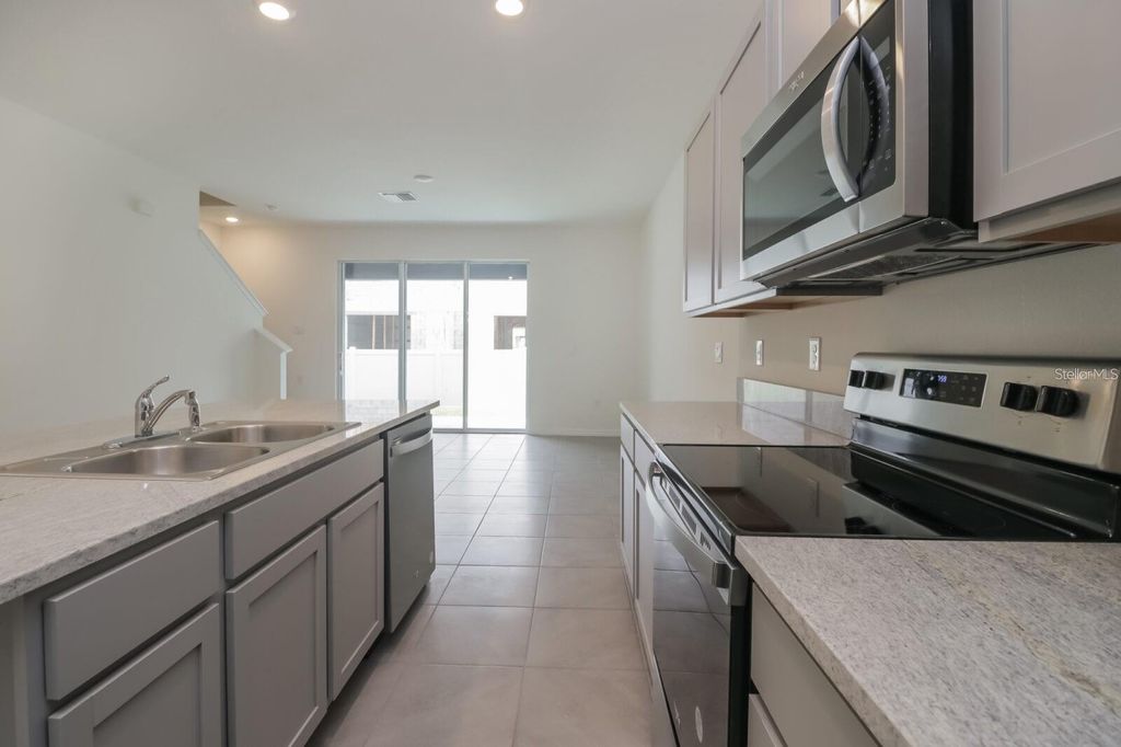 Photo of 2893 Peony Prairie Lane, Wesley Chapel, FL 33543 (MLS # TB8489212)