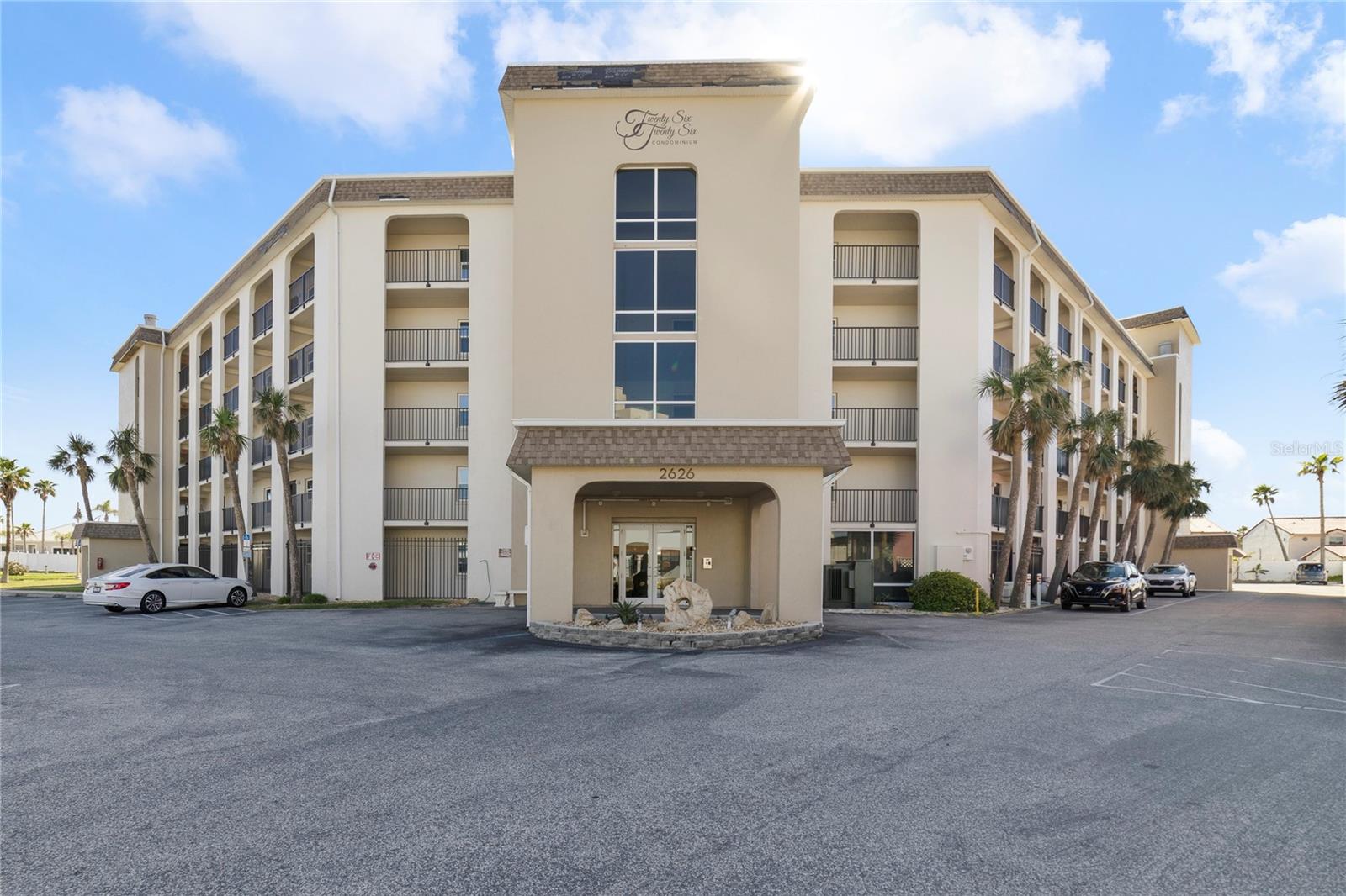 LIVE THE COASTAL LIFE OR ACQUIRE AN INCOME PROPERTY WITH SHORT TERM RENTAL OPTIONS in this superbly located FIRST FLOOR Condominium ACROSS THE STREET FROM THE BEACH. Nearby is a public ramp for easy vehicle, bicycle and pedestrian access. NEW AC, NEW VINYL PLANK FLOORING, NEW HOT WATER HEATER, NEW SLIDING DOOR AND WINDOWS, NEW INTERIOR PAINT, NEW ELECTRICAL PANEL. This home is in a secured building with enhanced safety which will ease your mind. With it's coveted FIRST FLOOR location you have easy access to the sparkling pool and lush courtyard just off your spacious patio. No need to wait for an elevator either. Park your vehicle in the reserved space just outside your front door. Close to restaurants, shopping and the ocean. Move in ready and furnishings are available at an additional fee. Schedule your private showing today.
