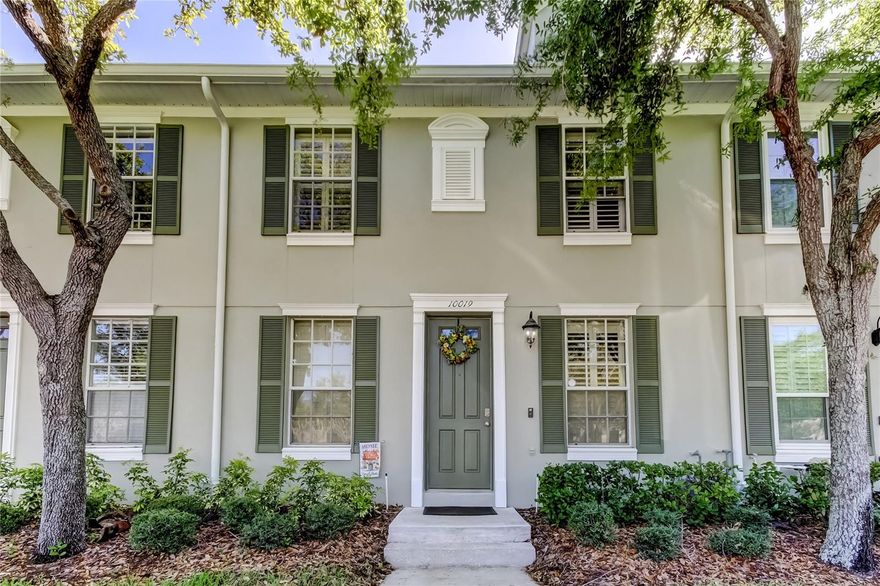 Fantastic townhome situated on a quiet street in West Park Village of Westchase.  Desirable location near shopping and dining, parks and recreation.  This townhome has been beautifully maintained and features many stylish upgrades including ceramic tile flooring,  ship lap accent walls, updated bathrooms, plantation shutters, granite countertops, and stainless steel appliances.  This is the ideal floorplan with a spacious family room and dining area arranged around the central kitchen.  Upstairs are three bedrooms and two full baths.  Sliding doors from the family room lead out to the spacious screened lanai which allows for BBQ and outdoor entertaining.  There is a detached two car garage with rear alley access.  Westchase continues its reign as one of the most desirable communities in all of Tampa Bay.  Excellent schools, exceptional community amenities and a central location make this the ideal place to call home.  ROOF REPLACED 2022, EXTERIOR PAINT 2025