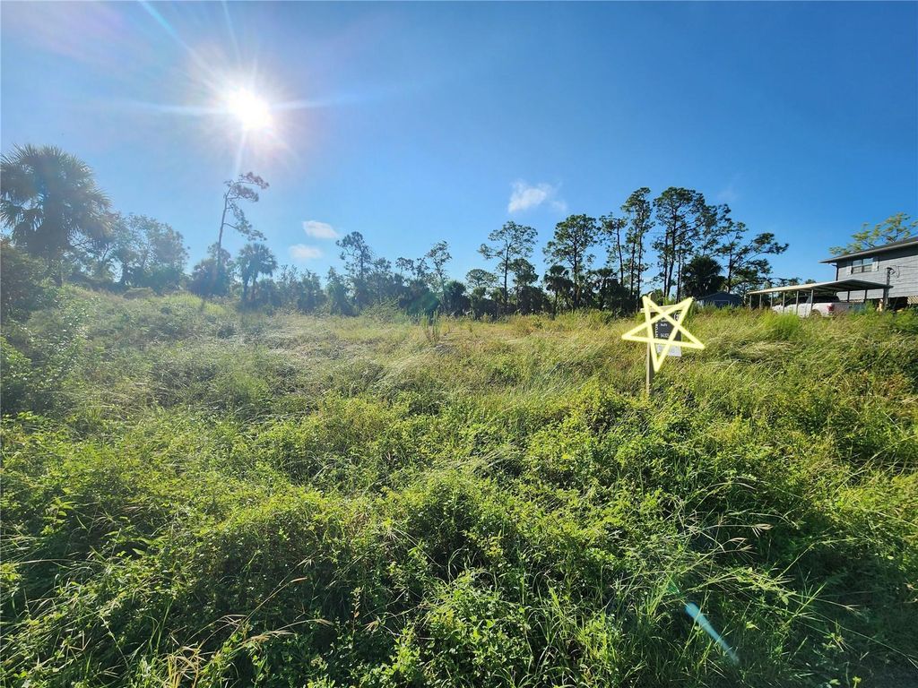 Photo of 1460 Eppinger Drive, Port Charlotte, FL 33953 (MLS # D6132404)