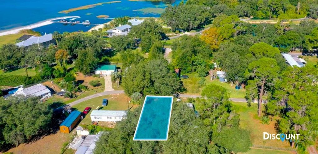 Photo of 12771 SE 143rd Court, Ocklawaha, FL 32179 (MLS # TB8469844)