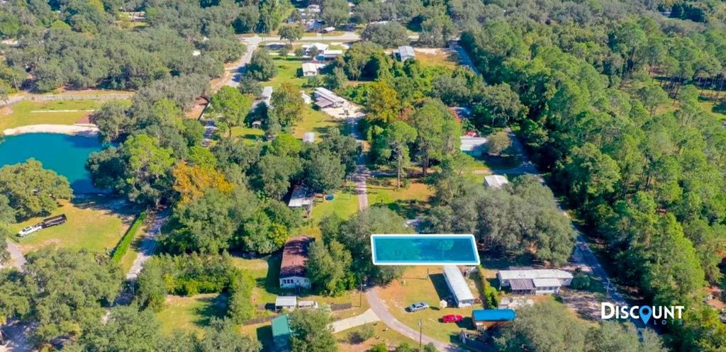 Photo of 12771 SE 143rd Court, Ocklawaha, FL 32179 (MLS # TB8469844)