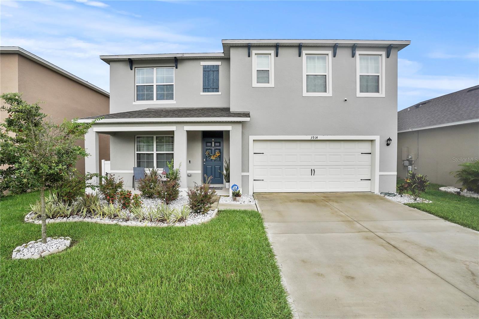 Move-in all block home ready and upgraded 2023 Hayden by D.R. Horton "Smart Home" with 5 bedrooms, 3 bathrooms, and over 2,600 sq ft of living space. This home includes a front porch and custom garden for extra curb appeal, plus a fully fenced backyard with turf grass and extended patio roof 40 ft x 12 ft with fans. Open floor plan, ADT alarm system with front/rear cameras, sensors on all downstairs doors/windows, as well as smart fire alarm that connects to a smart home app The app controls the light/plug, alarm, cameras, front door lock and thermostat and all under full warranty for life, granite counters, stainless appliances, water purification system plus reverse osmosis system in kitchen sink with a 10 year supply of shampoo, soap, cleaning products and there are 8 years left, and walk-in pantry. One bedroom and full bath located downstairs. Upstairs offers a loft, laundry room, and four additional bedrooms including a spacious primary suite. Located in Wind Meadows South Community featuring community, pool, playground and even a doggy park.