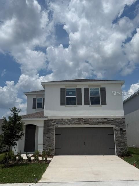 Photo of 5919 Snowfall Bend, Davenport, FL 33837 (MLS # O6397433)