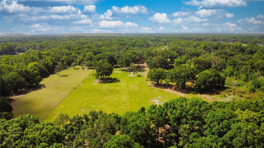Beautiful Pasture includes 2 large parcels of 9.4 total acres, completely fenced, out buildings, 19 x 40 shed, lean-to, horse or cow corral, deep well water and electric on property.  Lots of beautiful oak trees towards front, back of property completely cleared that backs up to railroad, pond, agriculture exemption for real estate taxes currently.  It is a buildable property, no mobile homes allowed.  One-of-a-kind property centrally located between Auburndale and Lakeland just minutes from 570 and I-4. Very peaceful setting.  Don't miss your opportunity to own your own land in the beautiful state of Florida.