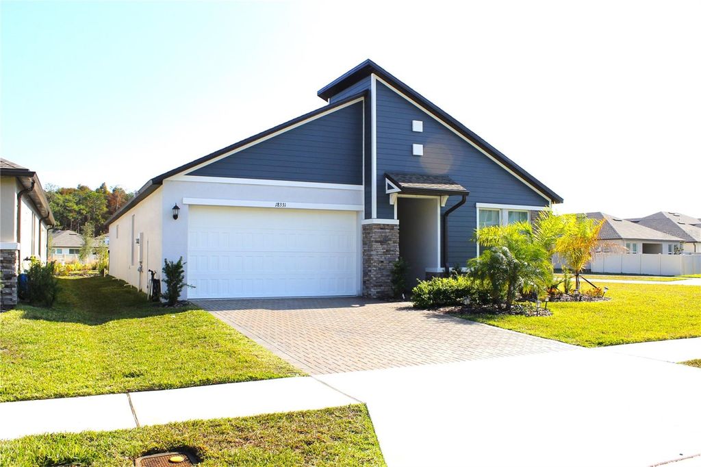 Photo of 18331 Serene Lake Loop, Lutz, FL 33548 (MLS # TB8455743)