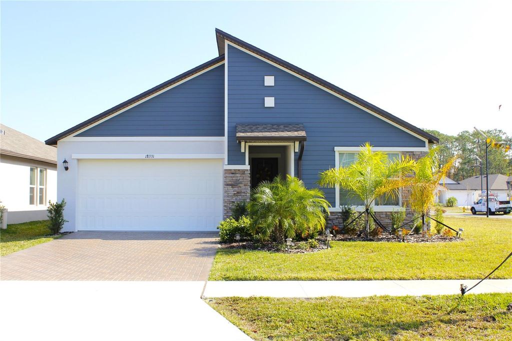 Photo of 18331 Serene Lake Loop, Lutz, FL 33548 (MLS # TB8455743)