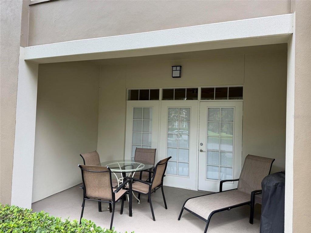 Photo of 1401 Celebration Avenue #103, Kissimmee, FL 34747 (MLS # O6449066)