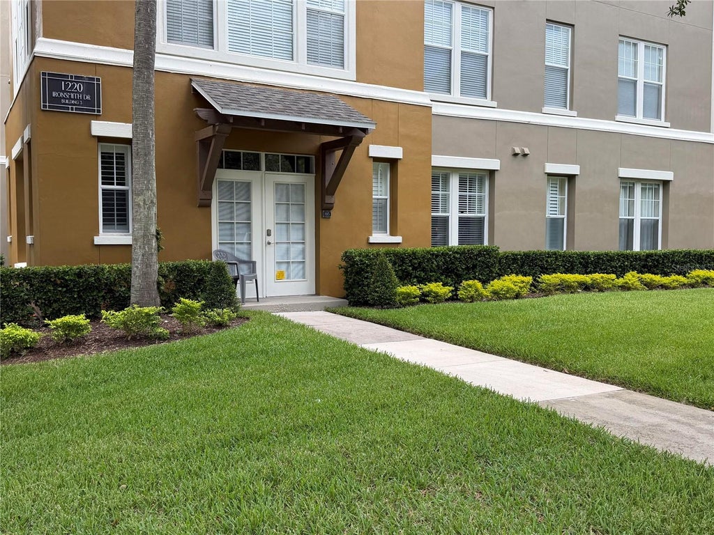 Photo of 1401 Celebration Avenue #103, Kissimmee, FL 34747 (MLS # O6449066)