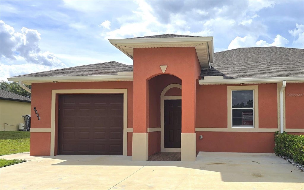 Photo of 2325 Daniel Avenue N, Lehigh Acres, FL 33971 (MLS # TB8541211)