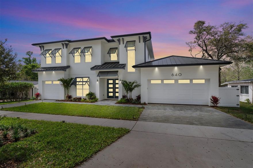 PRICE IMPROVEMENT!! New Construction with Winter Park Chain of Lakes Access!! You'll be stunned by this gorgeous coastal style home on a private canal that leads to Lake Maitland. This magnificent residence features 5 bedrooms, a bonus room, pool with a relaxing spa and brand new covered boat dock. Your journey begins in the grand two-story foyer featuring elegant lighting choices which are sure to impress. On the left is your study or flex space which can be used as a an additional bedroom as well. As you step into the generous and open grand room to your left is the elegant wine room. The open kitchen is a chef's dream featuring GE Cafe appliances , including a 36" freestanding range as well an Advantium oven and convection wall oven. Elegant slim shaker cabinetry and a large gathering island for entertaining complete this wonderful space. Off the kitchen is a scullery and laundry area with additional dishwasher and refrigerator for preparing grand holiday spreads. The dining room features an additional bar area with beverage refrigeration and overlooks the pool and canal so you can enjoy the views as you share a meal. Summers by the pool will be filled with grilling on the porch as you enjoy the lanai and days on the famed chain of lakes to beat the heat. The primary suite is off the living area and includes a sizable custom closet with everything you could need along with a spa-like bathroom to enjoy a relaxing evening before bed. Upstairs are the additional bedrooms which are generously sized for all of your occupants needs including a large bonus room. There's also a second laundry up to for extra convenience! This wonderful home also included a 12 x 30 Boat dock and sling style lift as well as landscape lighting. Energy savings will be yours with LED Lighting, tankless hot water heaters and spray foam insulation. You also have top rated schools and access to all the shopping, dining and entertainment this wonderful neighborhood offers. This beautiful home is completed and ready to move in- so make an appointment today to view this stunning new home and make it yours.