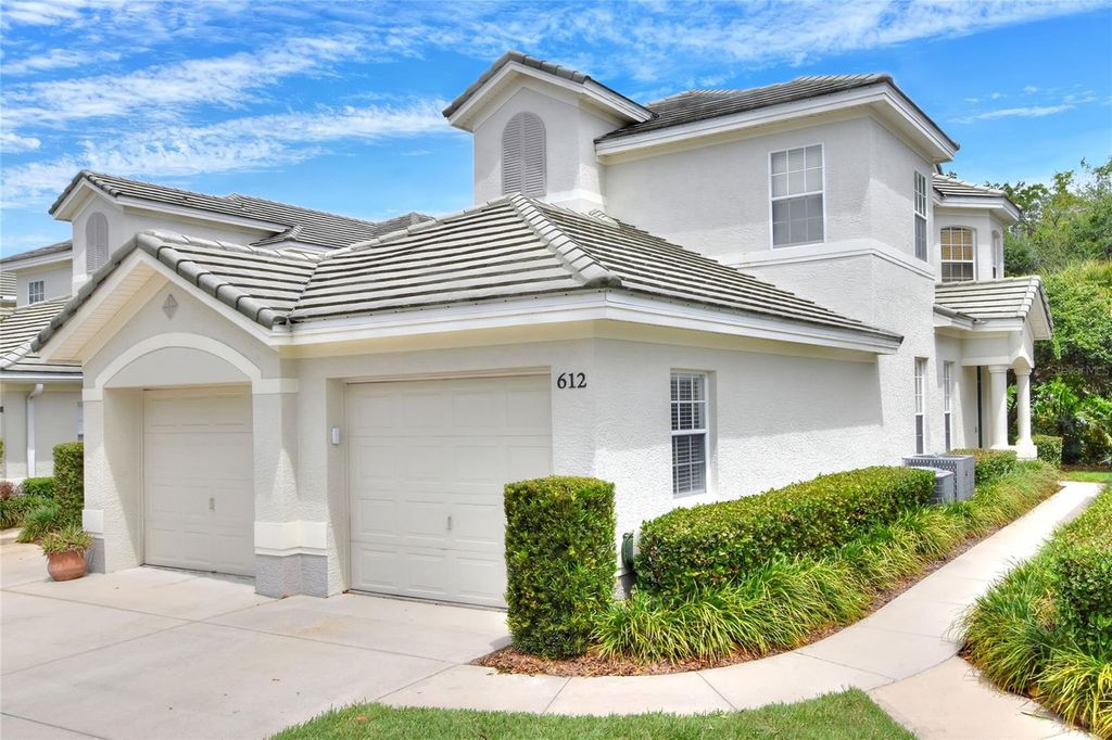 Photo of 612 Grasslands Village Circle #612, Lakeland, FL 33803 (MLS # P4938562)