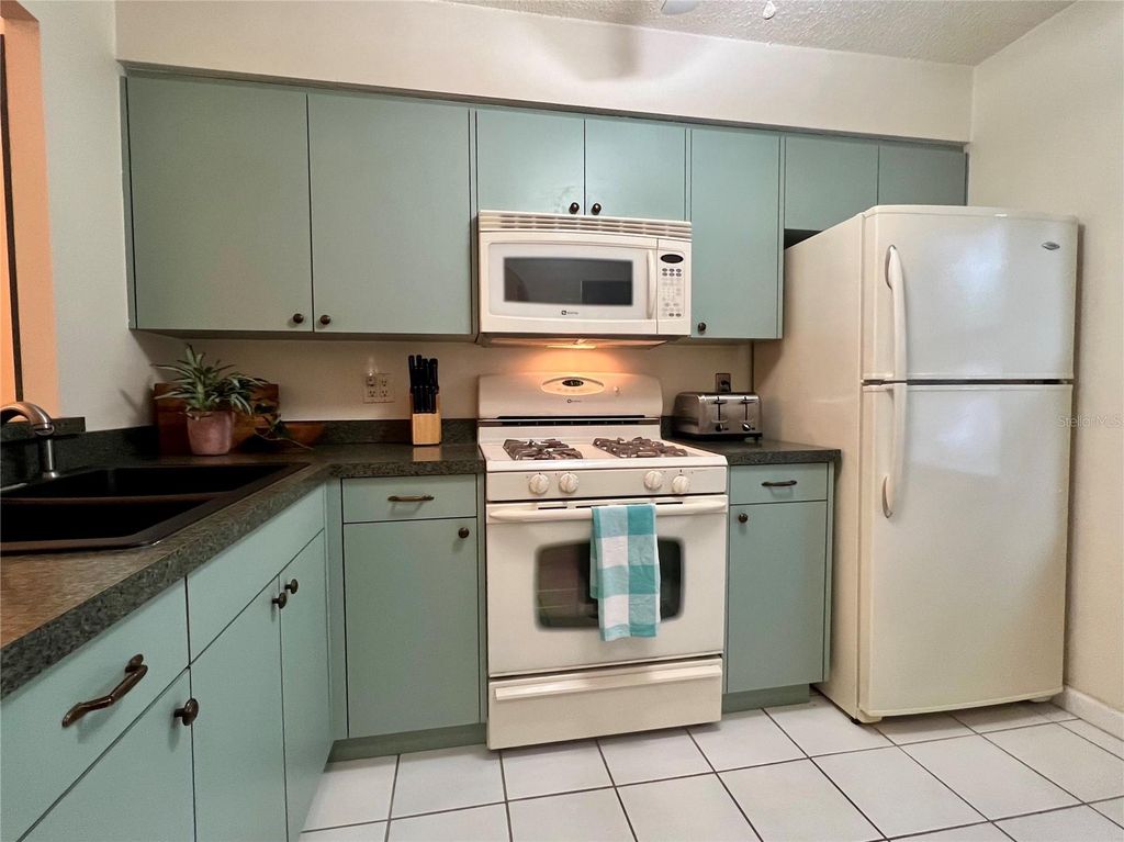 Photo of 1286 Mission Hills Boulevard, Clearwater, FL 33759 (MLS # TB8396663)