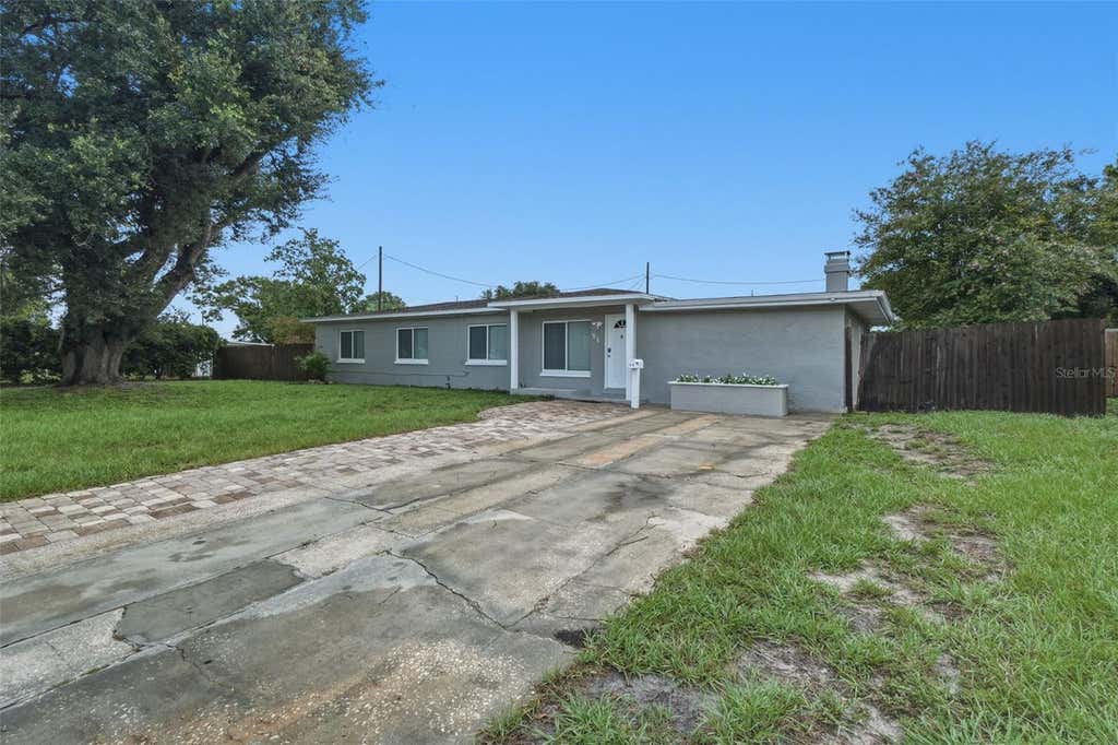 Photo of 55 Randia Drive, Orlando, FL 32807 (MLS # O6432044)