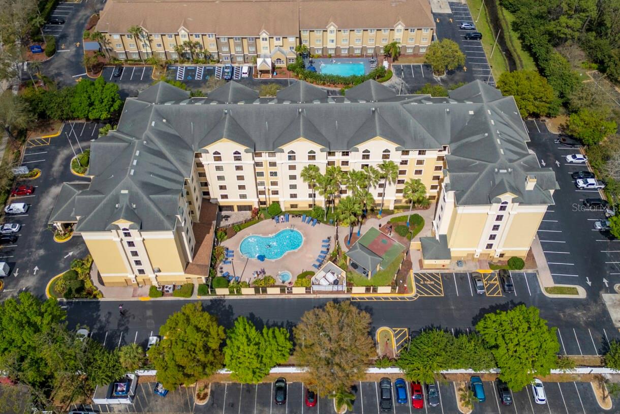 Incredible investment opportunity just 8 minutes from EPIC Universe and 10 minutes from the Orange County Convention Center! This fully furnished and COMPLETELY REMODELED 1-bedroom, 1-bathroom condo-hotel unit at SKY SUITES combines prime location, resort-style amenities, and high rental demand. With a private bedroom, living room with sleeper sofa, dining area, and fully equipped kitchen (refrigerator, microwave, stovetop, dishwasher, cookware and utensils), this unit offers everything for comfortable short-term stays. Guests enjoy two TVs, high-speed internet. The resort features an outdoor pool and jacuzzi, 24-hour fitness center, arcade, basketball court, and free parking. Just minutes from Walt Disney World, Disney Springs, Universal Studios, International Drive, SeaWorld, top shopping centers, and Orlando International Airport. With strong appeal to both vacationers and business travelers, the location drives consistently high occupancy rates and impressive rental returns. Short-term rentals are allowed, and with a remodel, this unit has the potential to double its income. A turn-key property with incredible upside—schedule your private showing today!