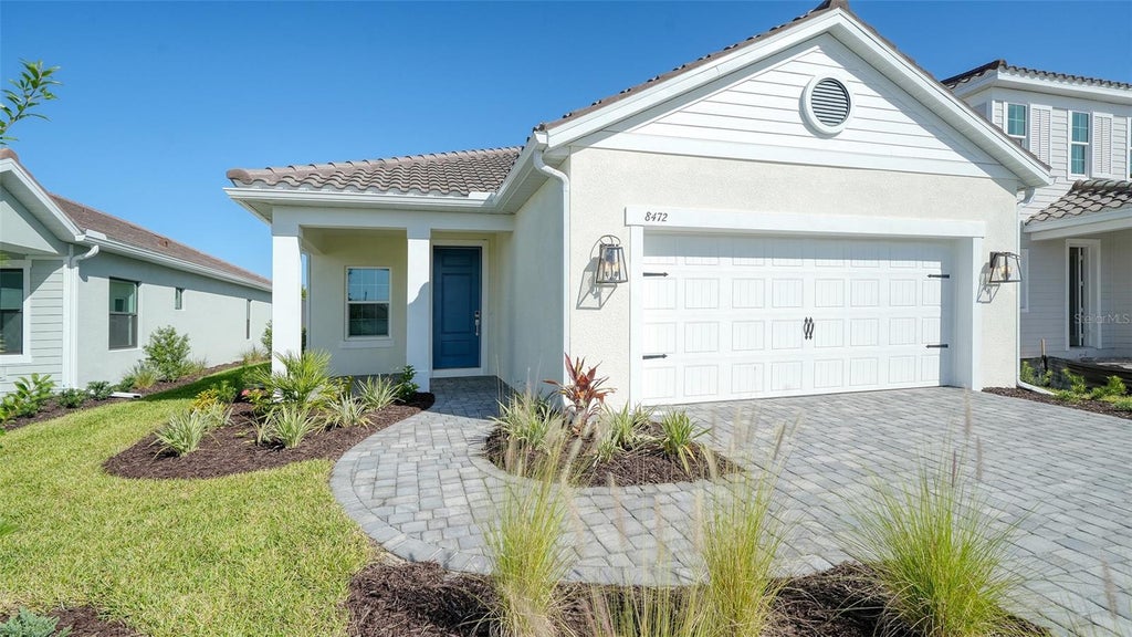 Photo of 8472 Anthirium Loop, Sarasota, FL 34240 (MLS # A4711459)