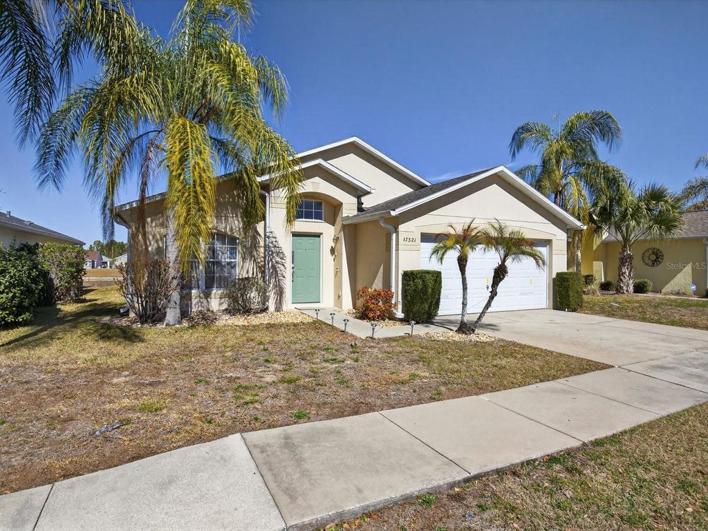 Photo of 17321 Woodcrest Way, Clermont, FL 34714 (MLS # O6381406)