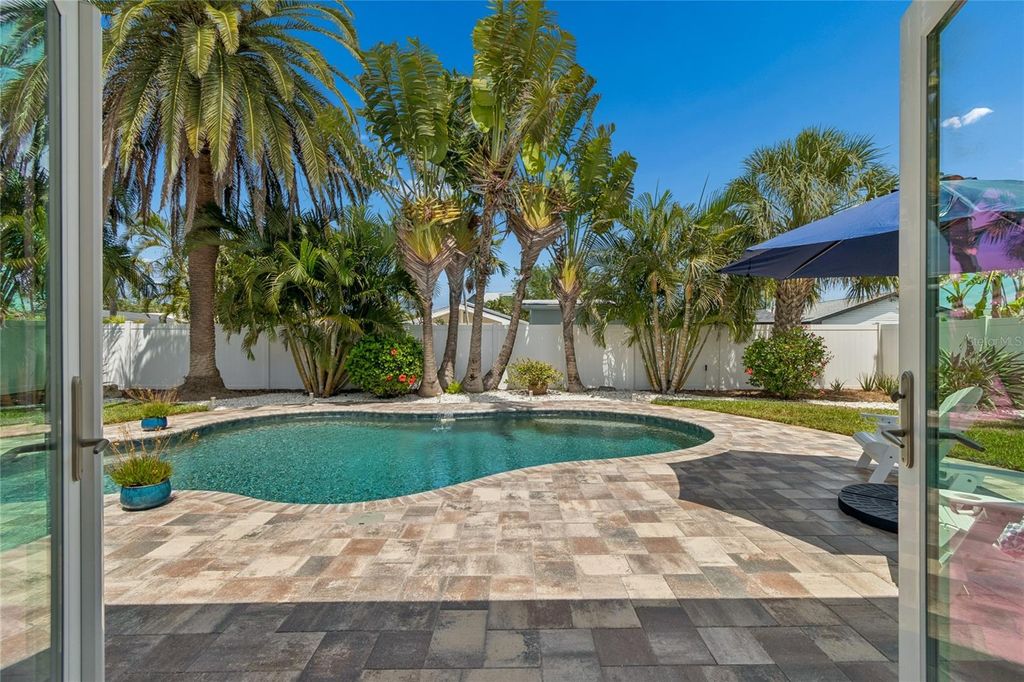 Photo of 230 S Julia Circle, St Pete Beach, FL 33706 (MLS # TB8498217)