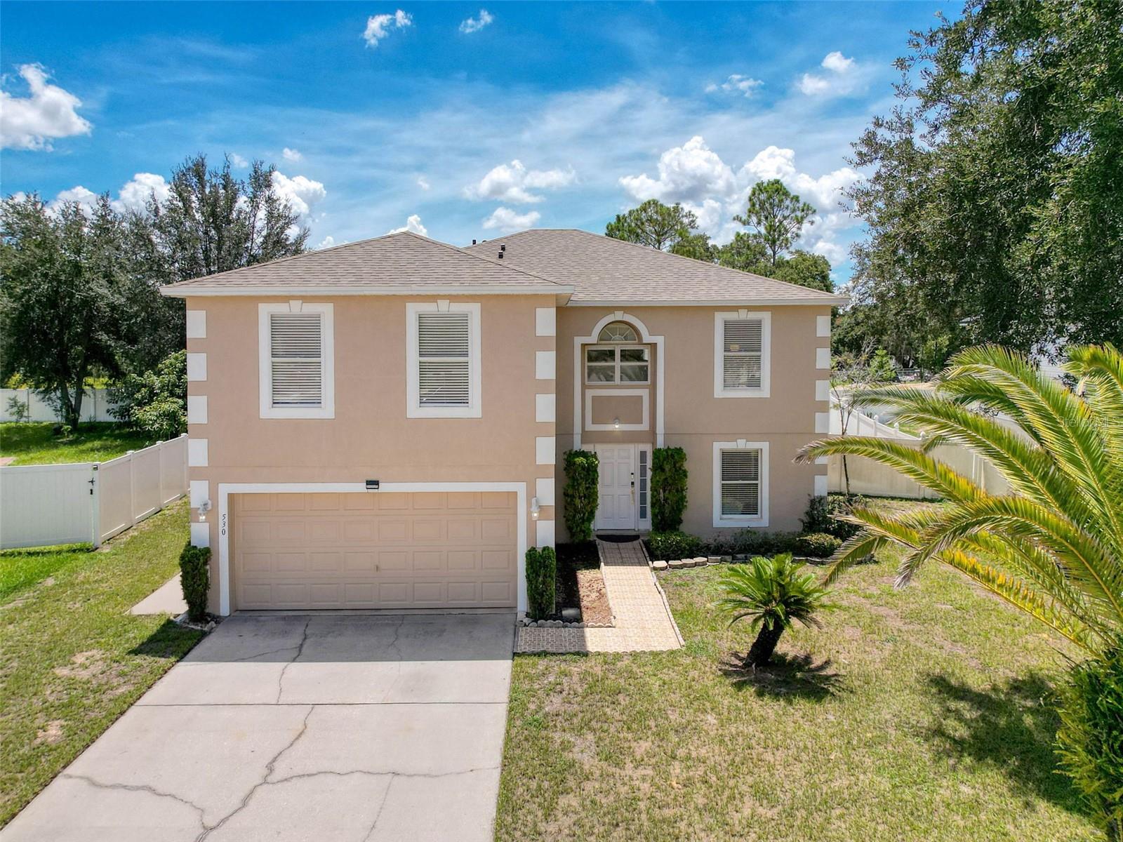 NO CDD & LOW HOA! New roof in December 2023! This 4-bedroom, 2.5-bathroom home with an office/flex room features open-concept living. The kitchen is a true centerpiece with granite countertops, an island with prep sink, dual walk-in pantries and 2024 smart appliances. The expansive primary suite offers dual walk-in closets and an ensuite bath with a make-up vanity, garden tub, and a separate water closet with walk-in shower. The oversized loft provides plenty of flexible space to customize to your needs. Equally impressive, the additional bedrooms provide exceptional space, offering a sense of comfort and privacy that makes every room feel like a personal retreat. Newly refreshed with interior and exterior paint in 2024, the home showcases brightness and offers a warm welcome. Start your mornings with coffee in the screened, covered lanai overlooking your fenced backyard. Ideally situated between Orlando and Tampa, you’ll enjoy quick access to I-4, Posner Park shopping, Heart of Florida Hospital, Publix, and top attractions like Disney, Legoland, Universal, Bok Tower Gardens, and local nature trails-offering the best of Central Florida. Be sure to explore the 3D walk-through link for an immersive virtual tour of this beautiful home! Schedule your showing today!