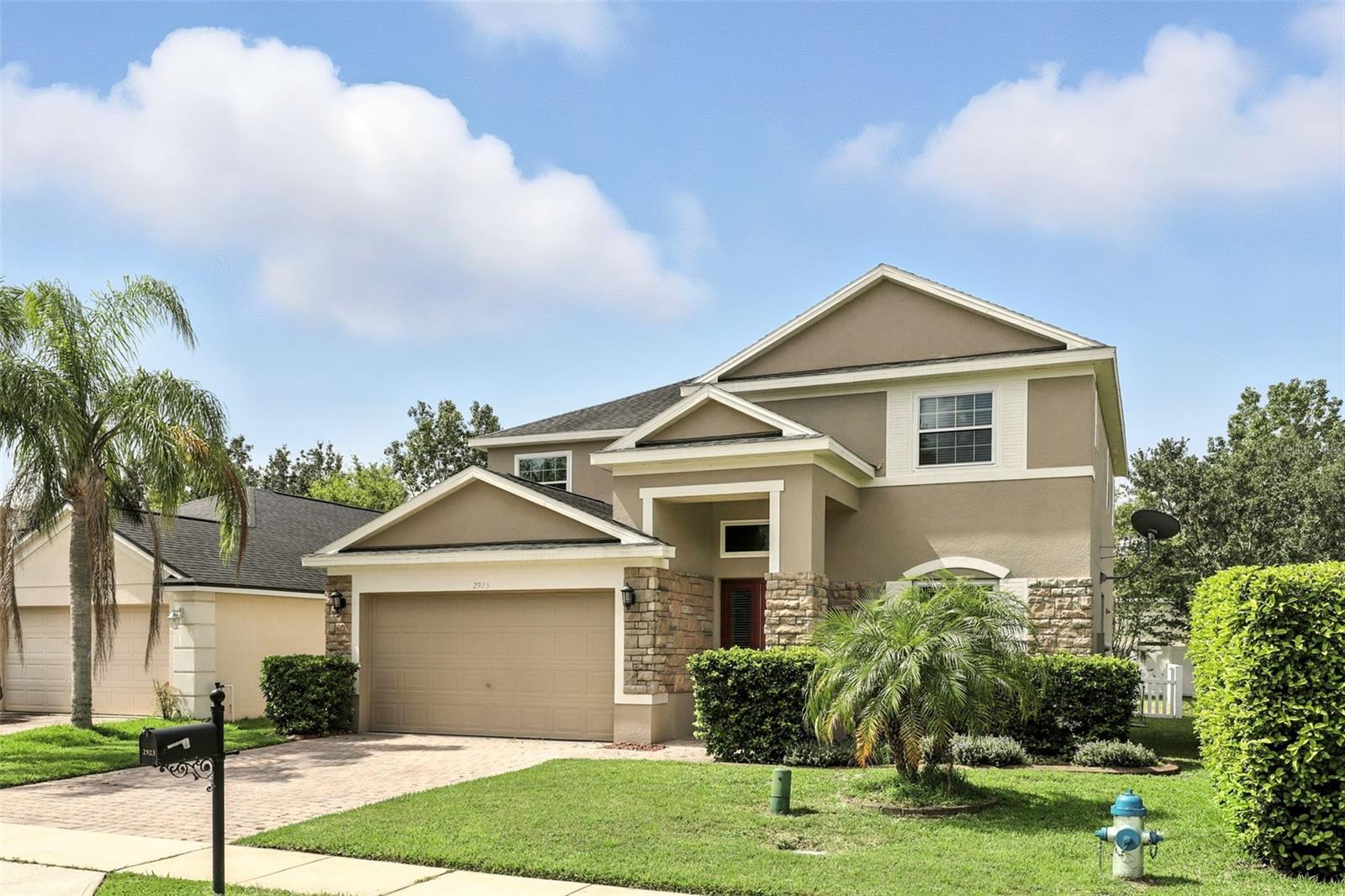 One or more photo(s) has been virtually staged. Here is your opportunity to live in THE SANCTUARY in Oviedo. This exquisite two-story, single-family residence offers 5 bedrooms, 3 bathrooms, spacious 2-car garage and an inground pool and spa. Step inside and be captivated by the open floorplan designed to enhance both style and functionality. Master suite, guest bathroom and three bedrooms are upstairs. The fifth bedroom/office/in-law suite is conveniently located on the main floor. The first floor showcases a combination of beautiful tiles throughout creating an elegant and easy-to-maintain living space. On the second floor new carpet has been installed in all bedrooms , hallway and stairs (2025). The home interior, garage floor and pool deck have been freshly painted (2025). Roof replaced (2015). Upgraded double-pane windows and rear sliding glass door keep the inside of the home nice and cool as well as energy efficient. Visit the clubhouse and see the amenities which include pickleball court, pool, workout center, basketball court and playground. Moments away are the Oviedo Mall, Oviedo Hospital and esteemed University Of Central Florida. This is a fantastic home in a premier school district!