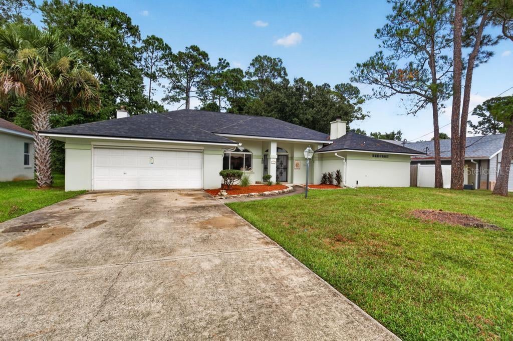 Photo of 110 Wellington Drive, Palm Coast, FL 32164 (MLS # GC543289)